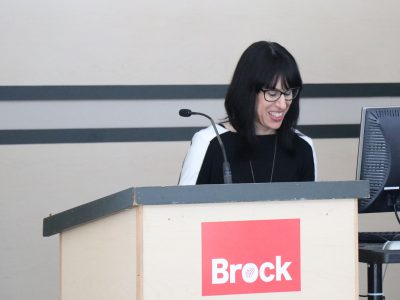 Shauna Pomerantz speaking at the 