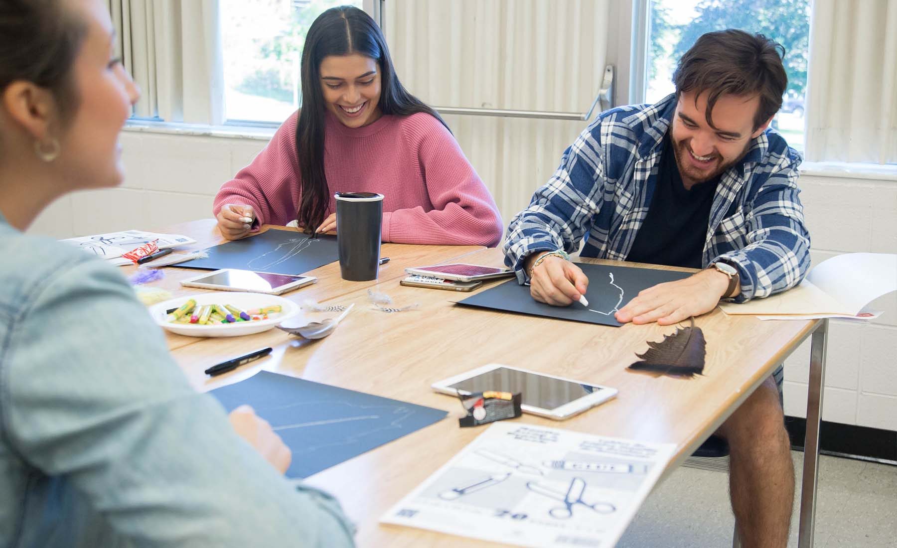 Brock Teacher Candidates drawing during a visual arts workshop at the 2019 Arts Matter Conference