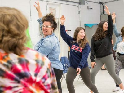 Brock Teacher Candidates dancing during a dance workshop at the 2019 Arts Matter Conference