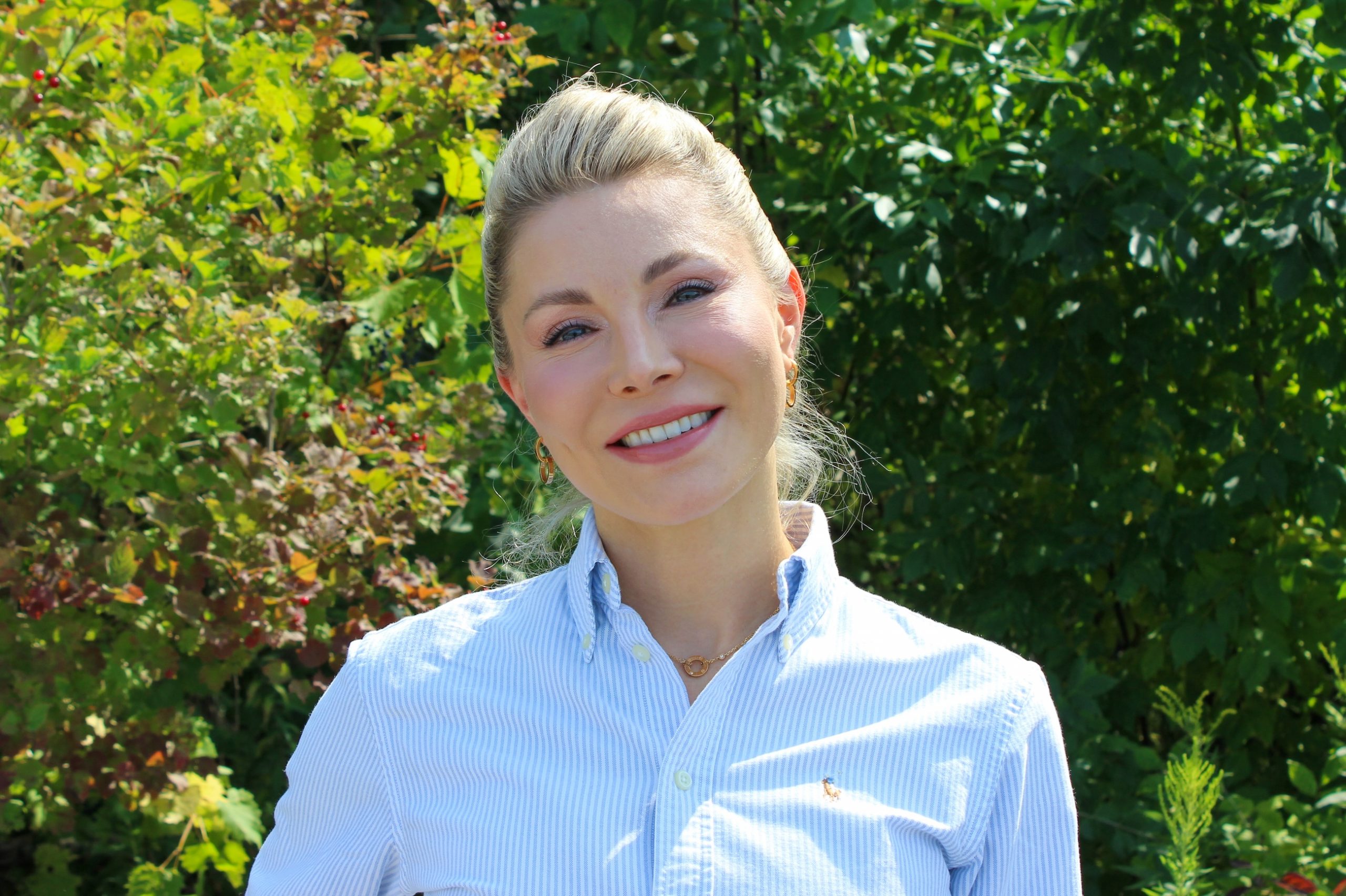Bolgarova Final Elena Bolgarova standing in front of trees.