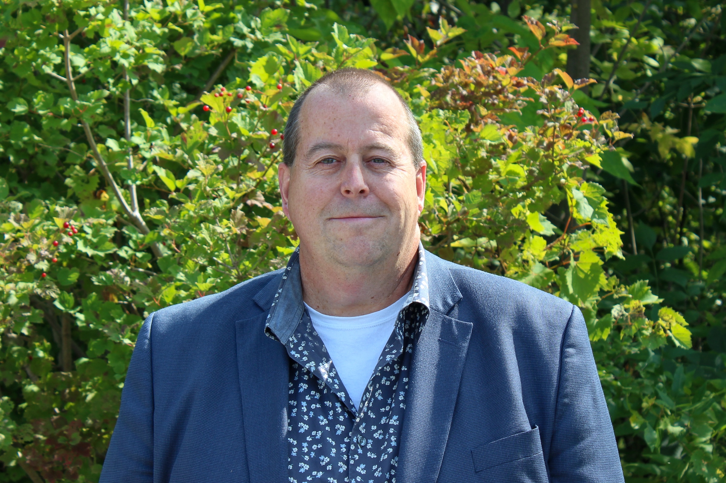 Cribbs Final David Cribbs standing in front of trees.