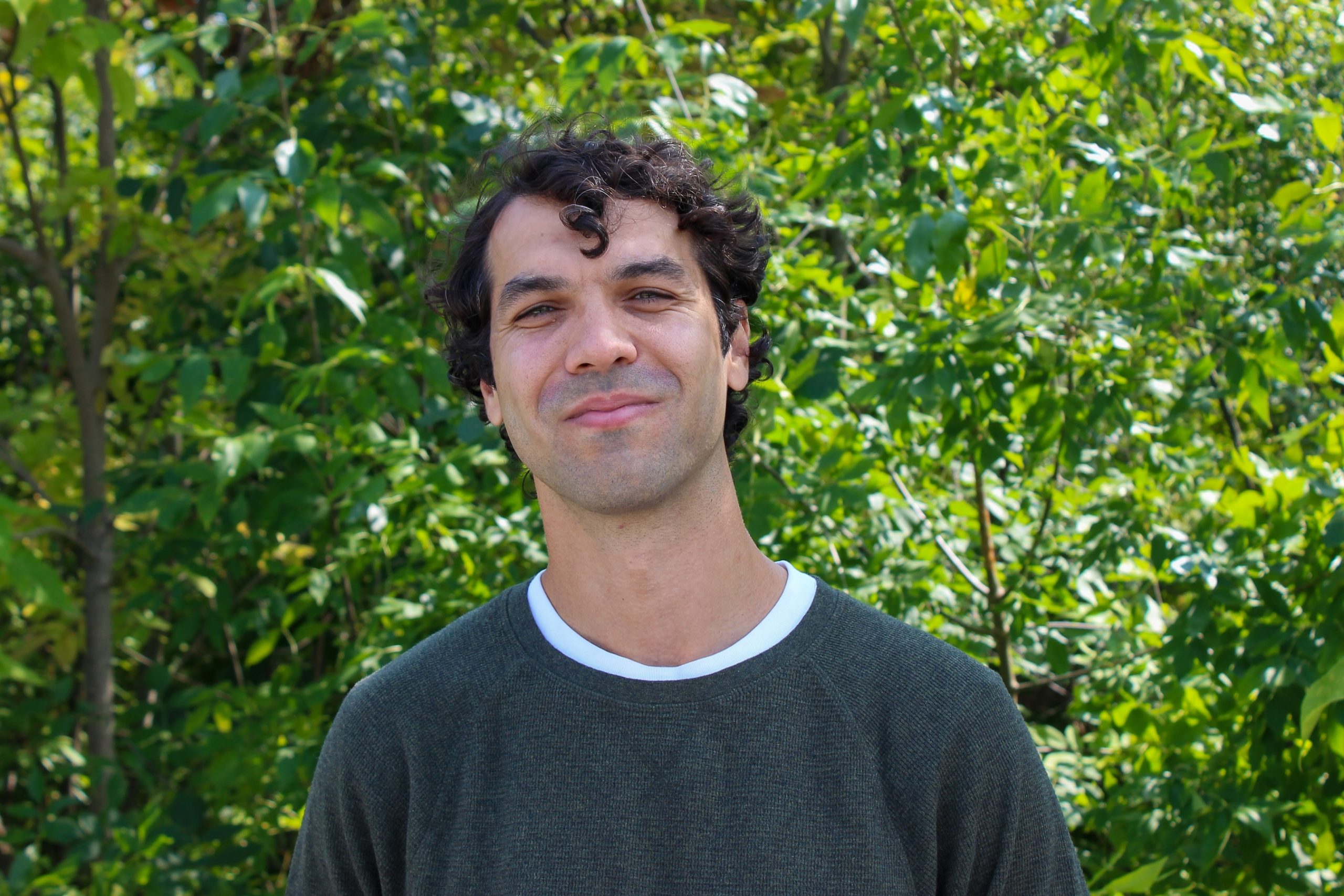 Fadavi Final Darius Fadavi standing in front of trees.