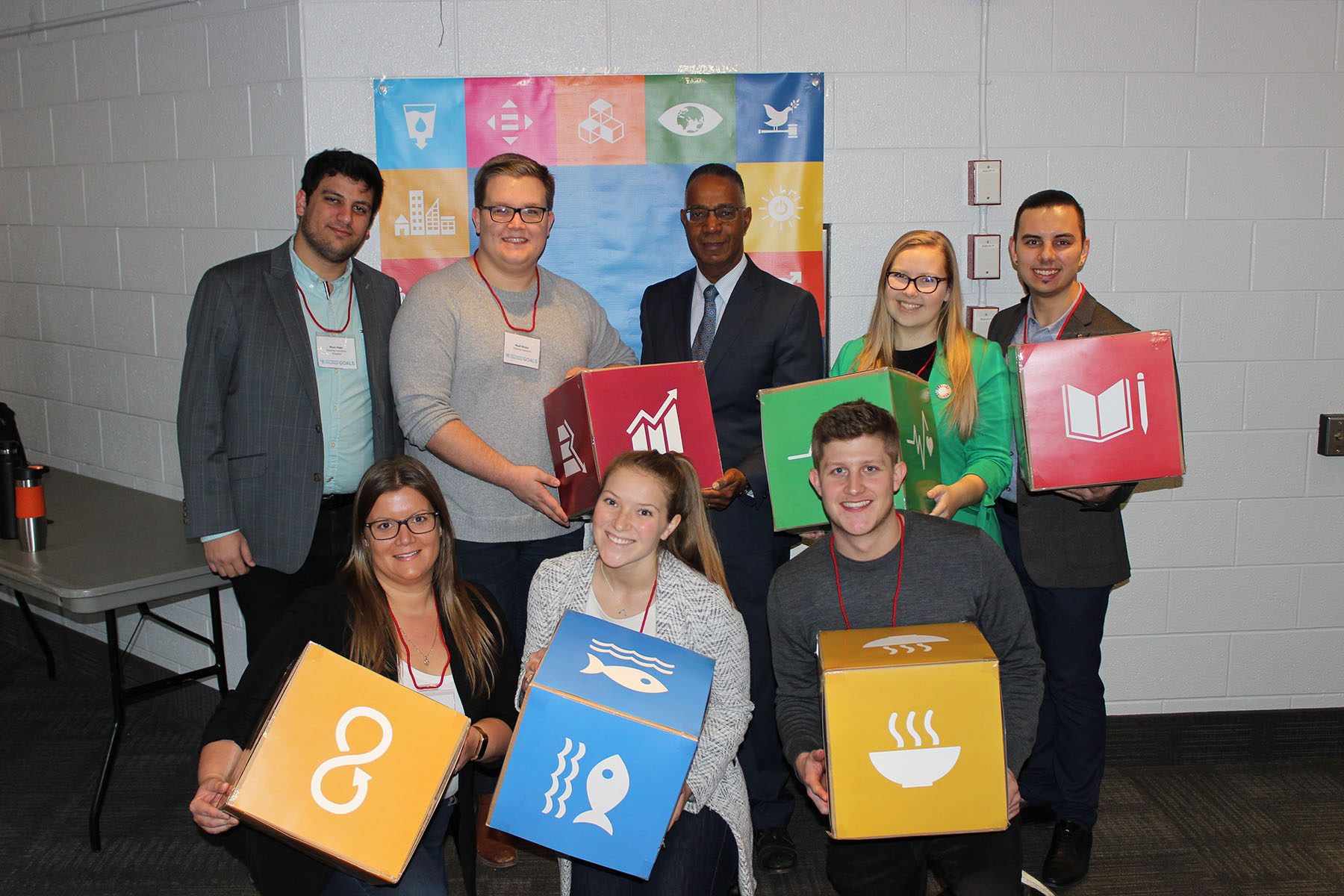 Group of students with SDG symbols