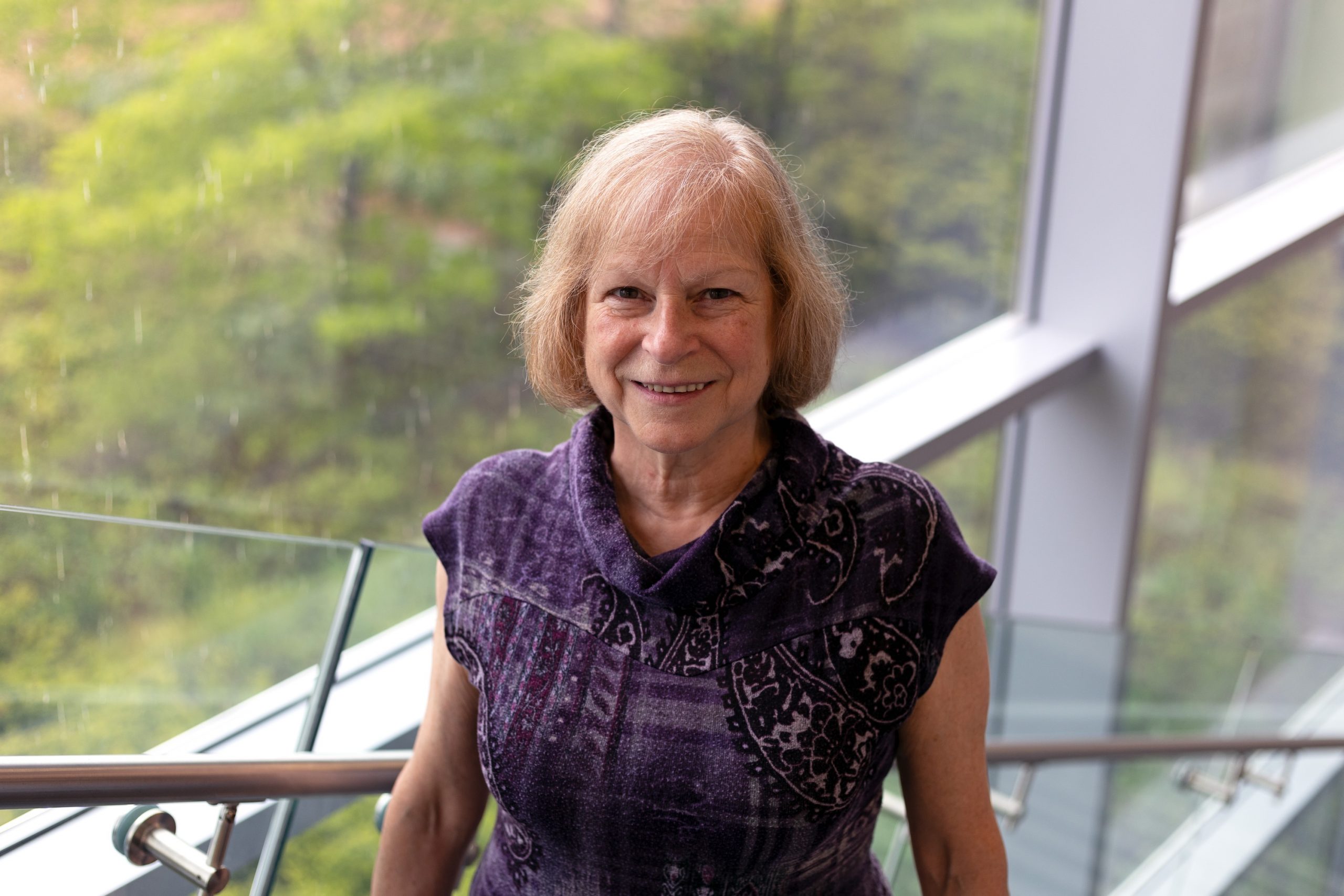Brock University Professor Liette Vasseur standing on a stairway.