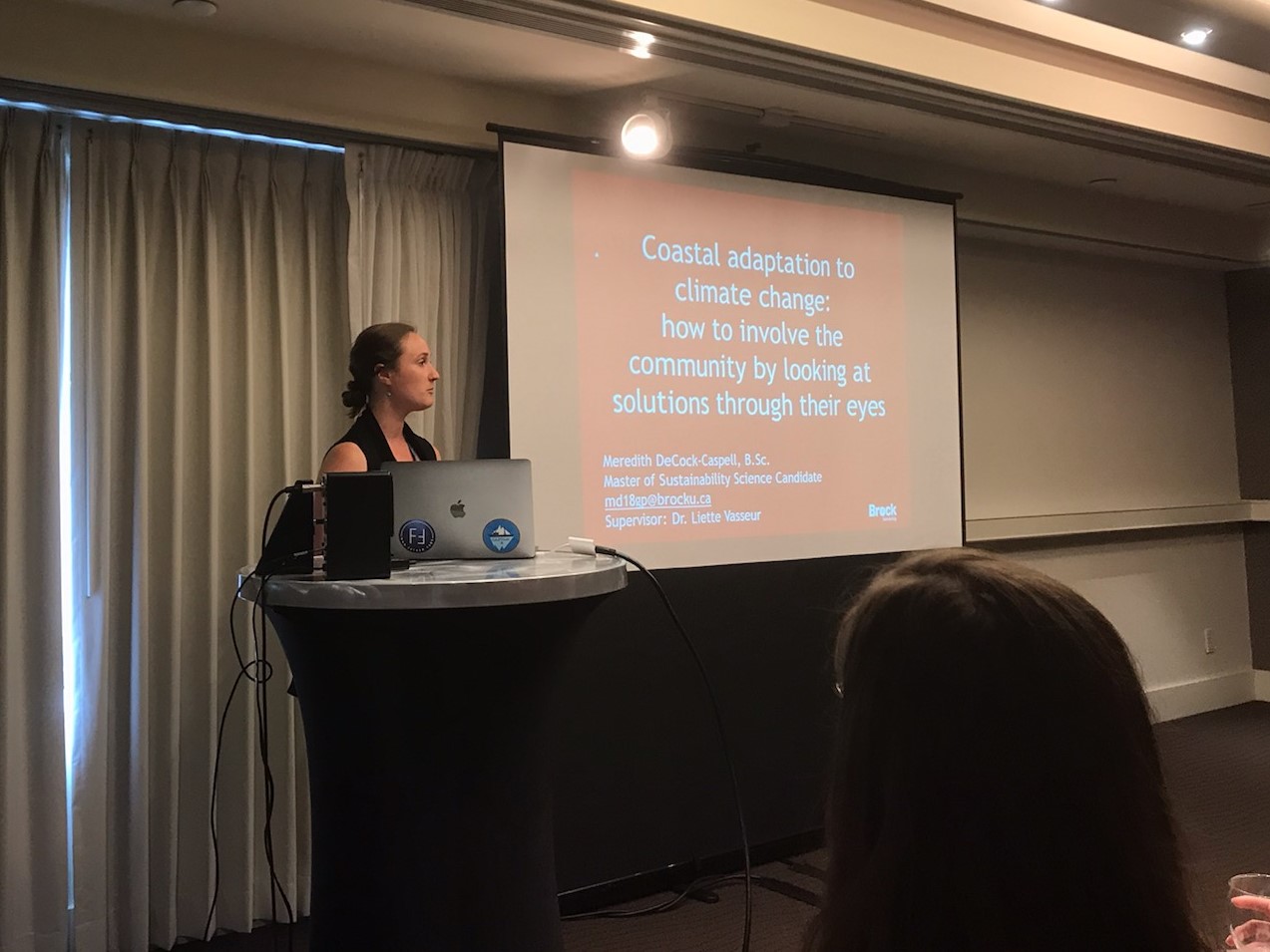 Meredith presenting at a conference