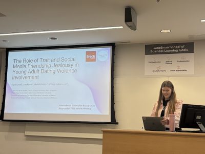 Kayla Lewis presents her research at ISRA 2026