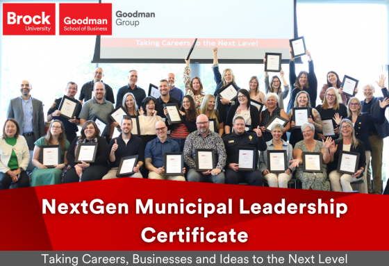 A group of people proudly displaying certificates