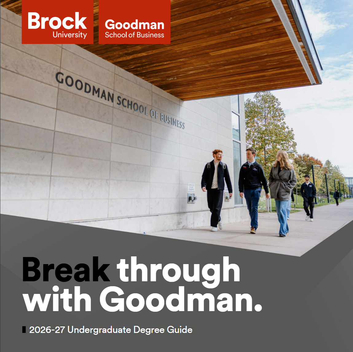 Viewbook cover photo, three students walking outside the Goodman School of Business. Text "Break through with Goodman, 2026-27 Undergraduate Degree Guide"