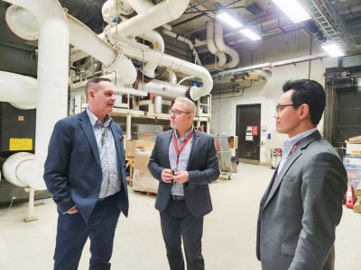 Bernard Derible, Deputy Minister and Commissioner, Emergency Management Ontario (left) meets with Senior Associate Vice-President Infrastructure & Operations (centre) and Ken Chan, Vice-President Administation (right) tour Brock University's District Energy System.