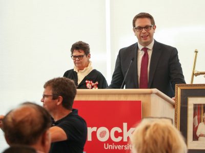 man at podium for Citizenship ceremony