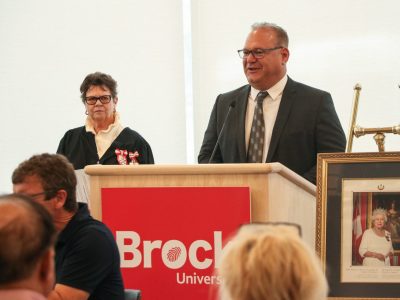 man at podium for Citizenship ceremony