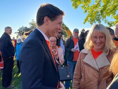 Dr. Lynn Wells, Provost and Vice-President, Adacemic, with Prime Minister Justin Trudeau on National Day for Truth and Reconciliation in September 2022.
