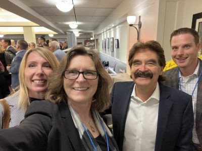 Dr. Lesley Rigg with faculty and Wayne Gates