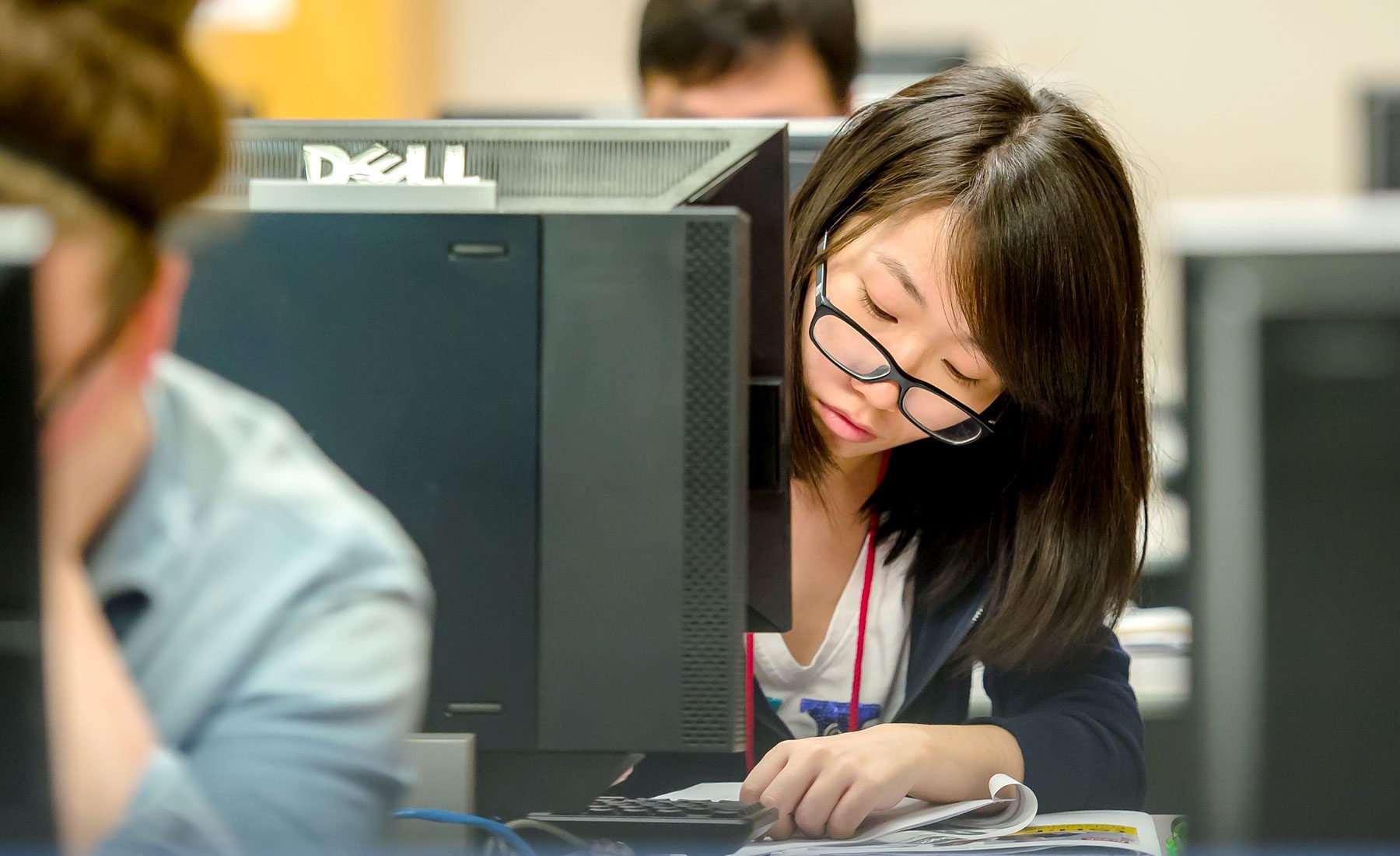 Female student working in a computer lab