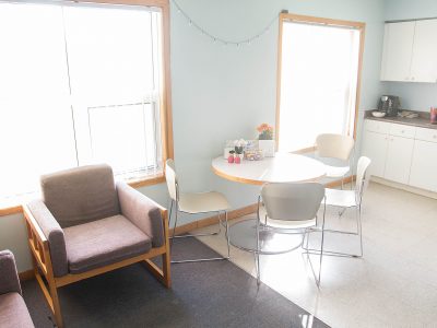 View of Village table and kitchen from common area