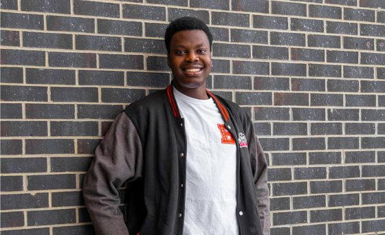 rls staff member daniel stands by a wall in residence 8