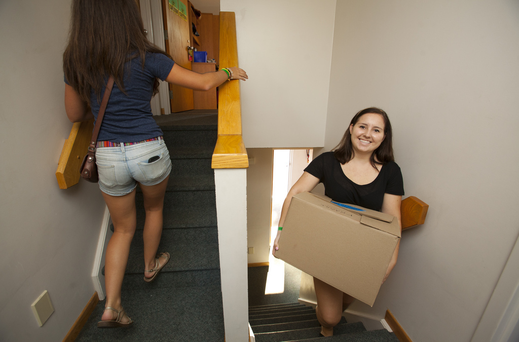Student helping with move in
