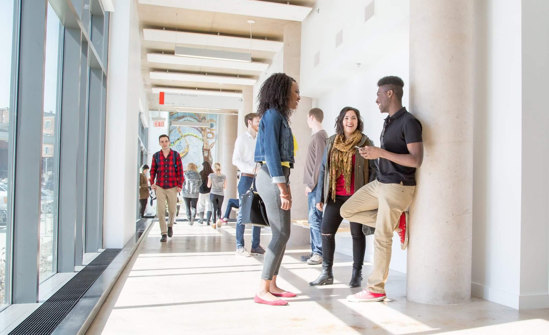 students gathered in hallway within Brock University 