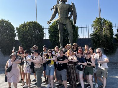 group of students on a Study Tour of Greece at large statue of Alexander the great