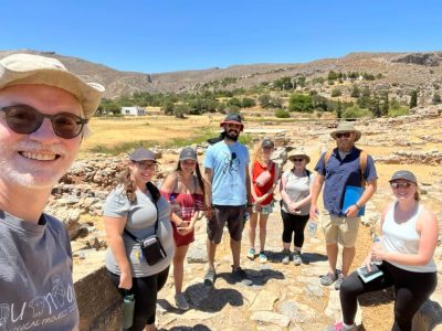 7 students and professor take a selfie At Kato Zakros