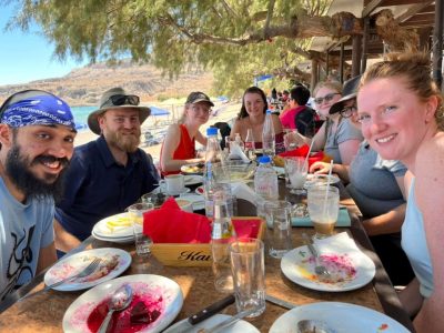 7 students at lunch on the beach at Kato Zakros