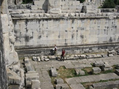 Dr. Dolansky and Dr. Greene are dwarfed by the architecture at Didyma