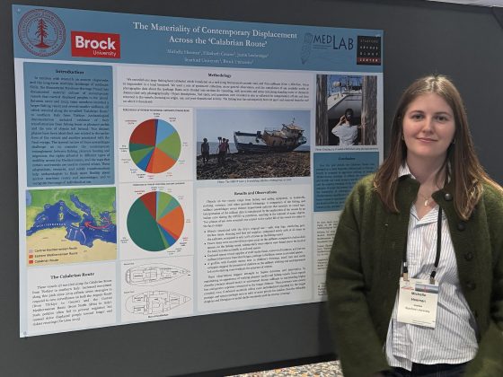 Student presenting poster at the AIA Annual Meeting