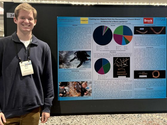 Student presenting poster at the AIA Annual Meeting