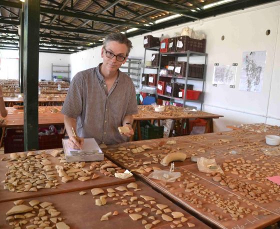 Angus Smith works on ceramics from Gournia