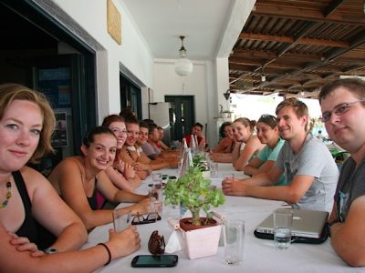 group of students suitting at a meal at Mochlos