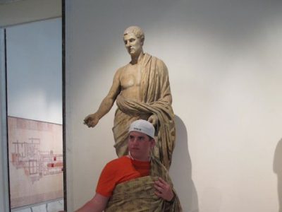 Michael imitates the guise of a Roman senator