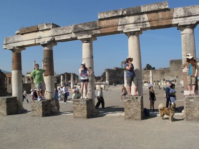 students pose in Pompeii