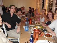 Students sitting at table for a dinner