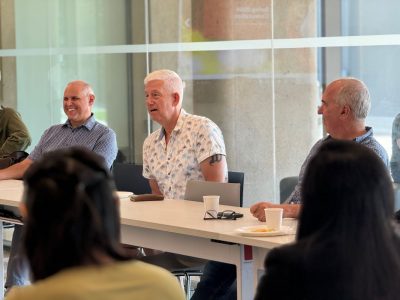 in discussion with HUMA students a t table
