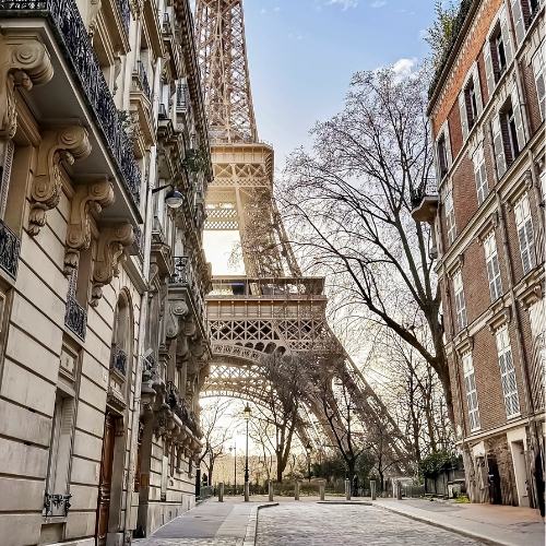 NEOMA Business School logo and view of Eiffel tower