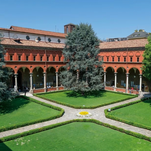 Universita Cattolica del Sacro Cuore logo and scool bulding in Italy