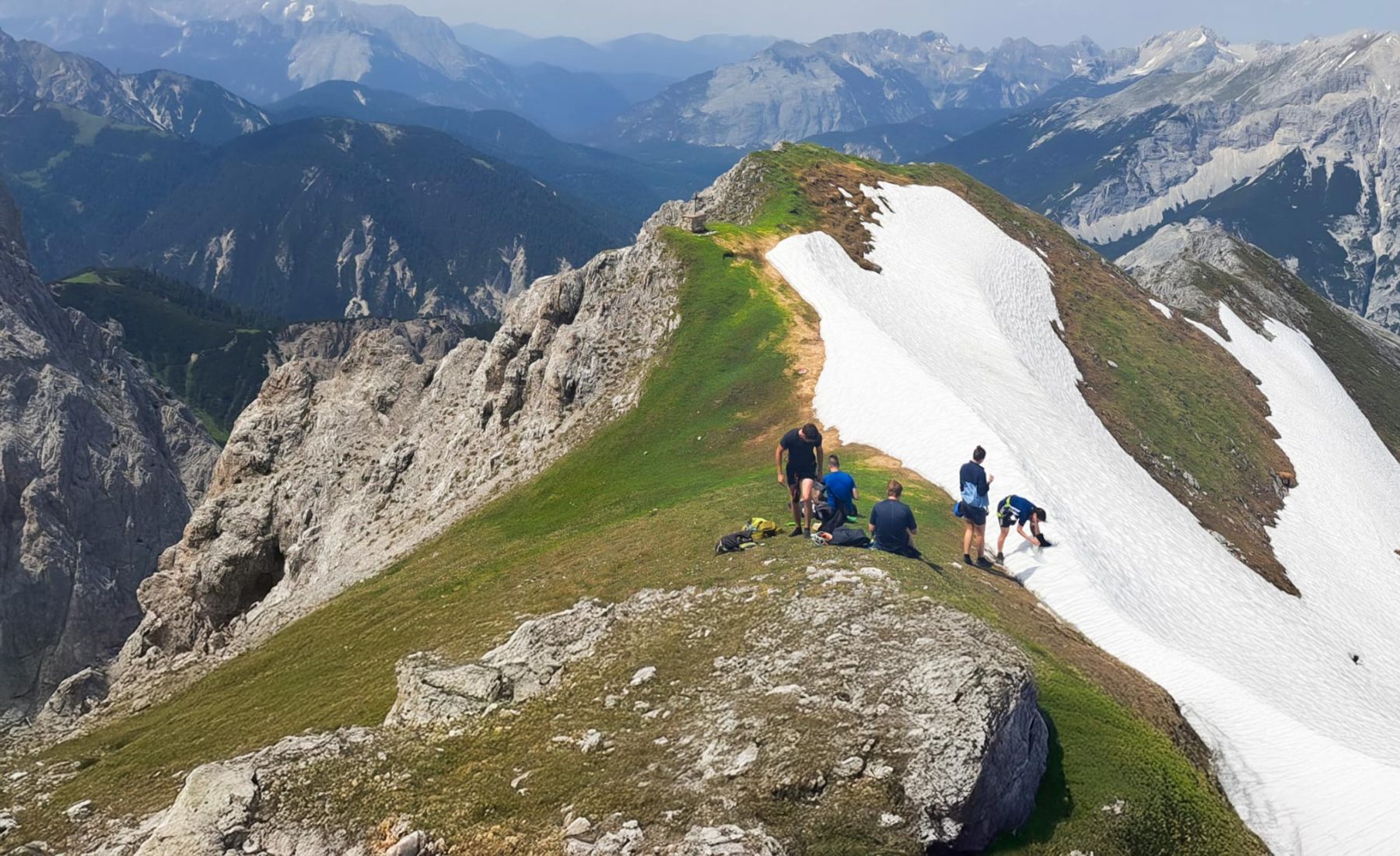 University students conduct research atop a snowcapped mountain in Austria. 