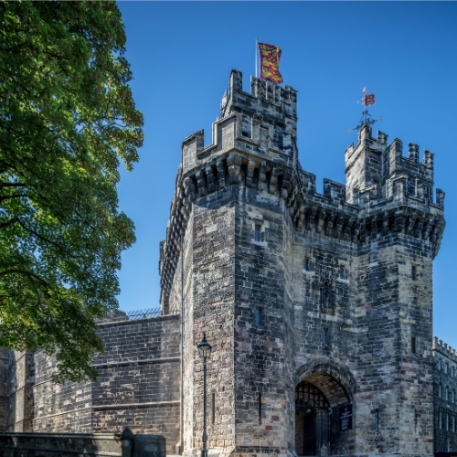Lancaster University Management School logo and view of Lancaster castel
