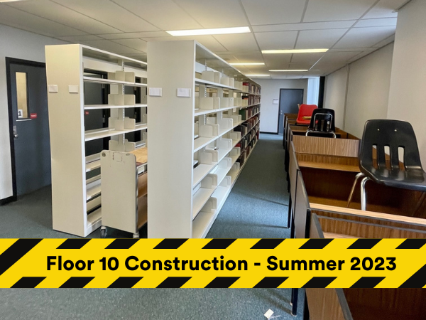 floor 10 of the Schmon tower showing empty bookshelves and chairs stacked on top of desks.