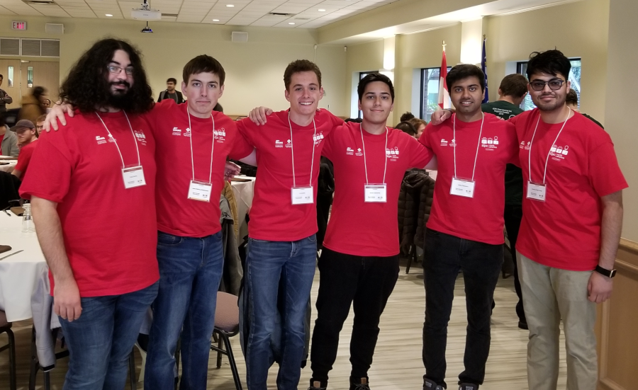 Six Brock Computer Science Students wearing red t-shirts 