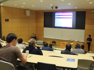 CCCG event photos - meeting room with presenter