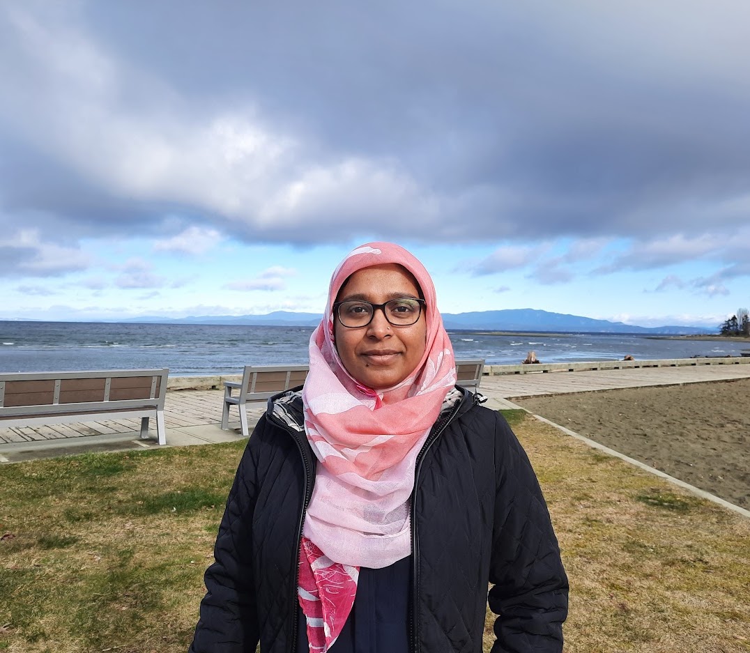 Headshot of Dr. Rahnuma Islam Nishat, Assistant Professor of Computer Science at Brock University, photographed outdoors beside a lakeshore.