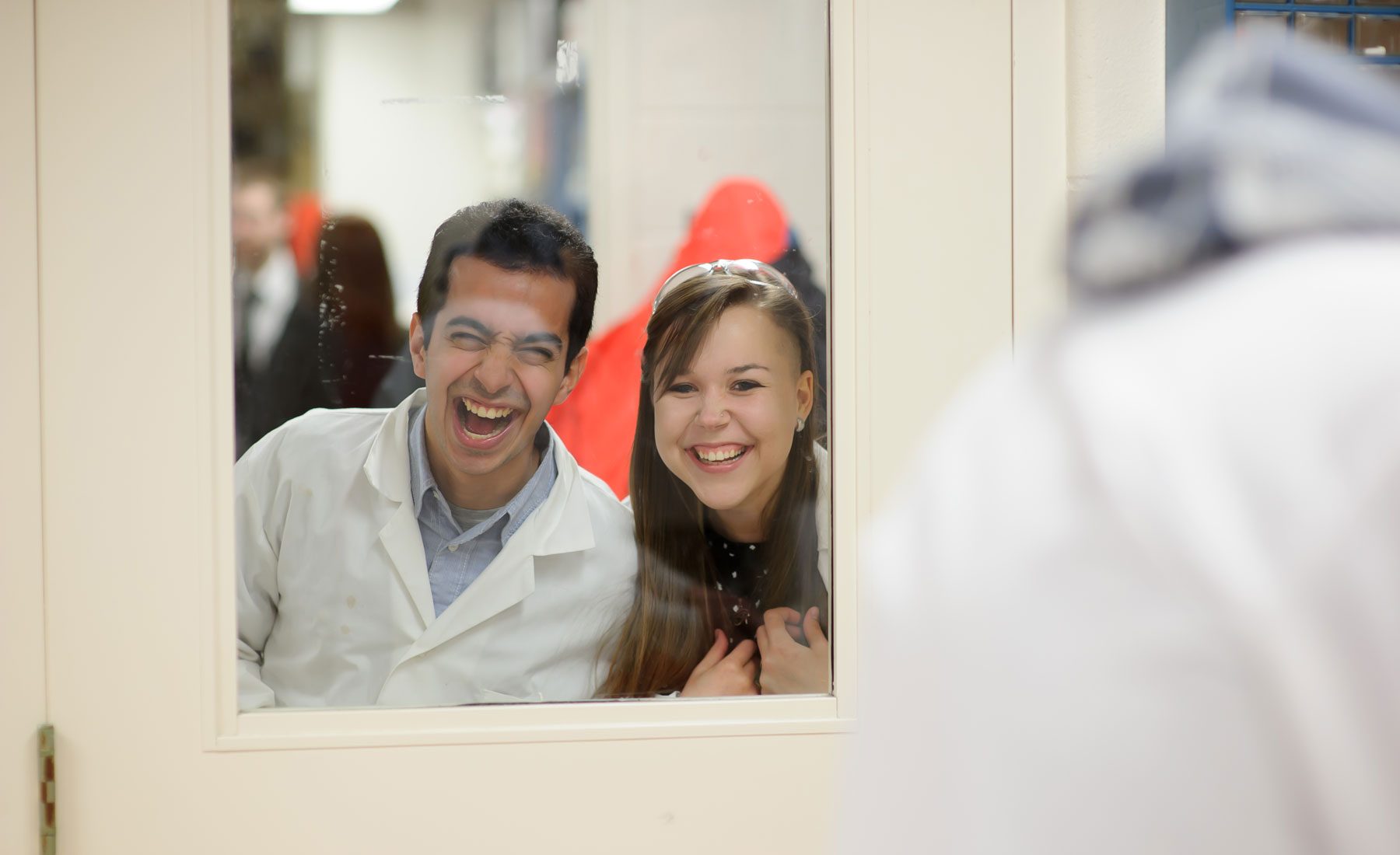 Students looking into a lab
