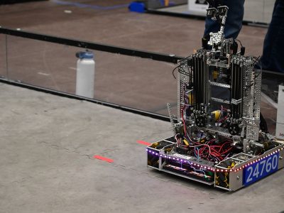 Close up of a robot in a practice field on grey smooth flooring