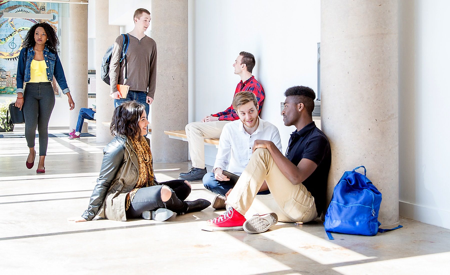 Group of students hanging out in Marilyn I. Walker hallway