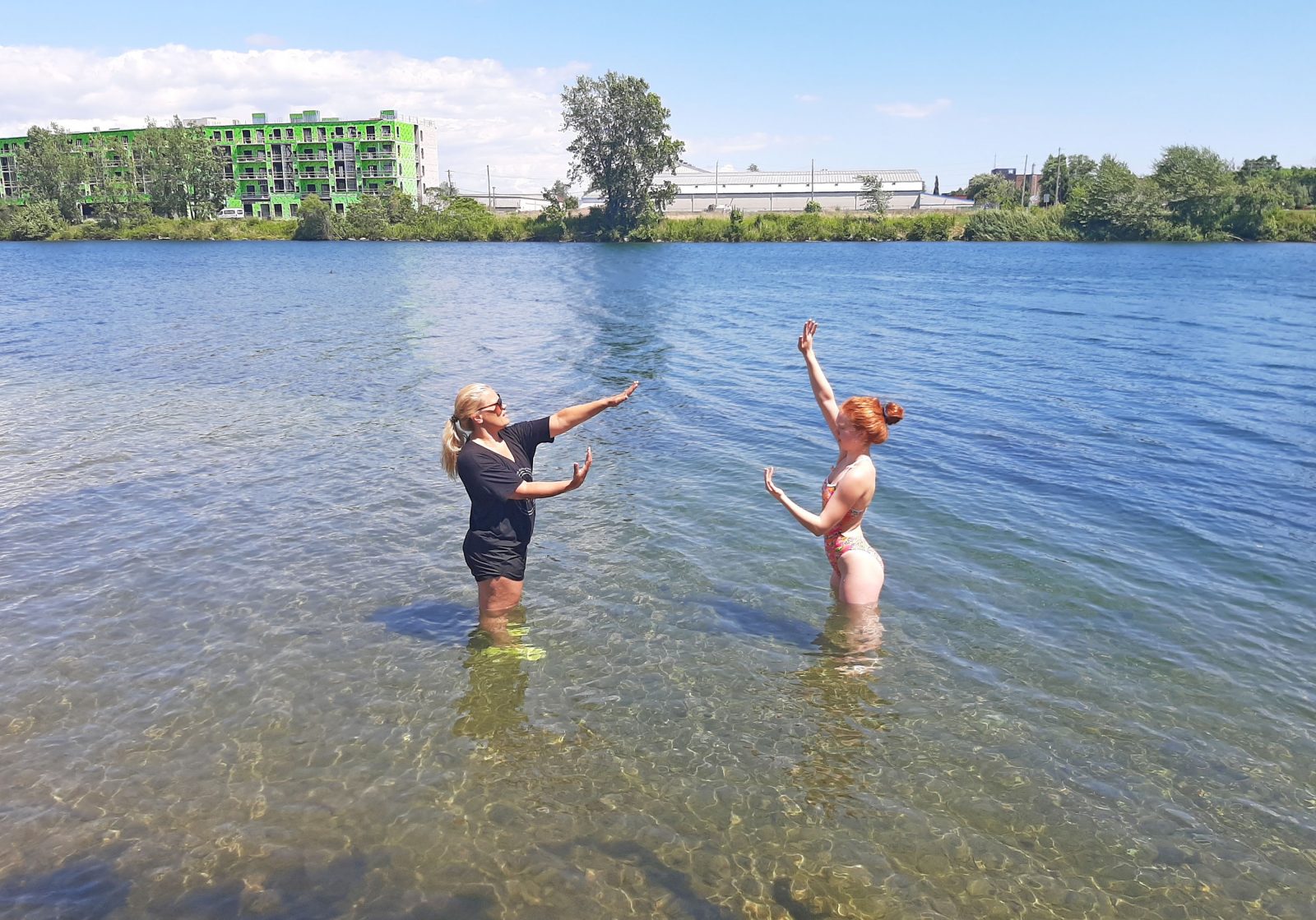 A swimmer and choreographer rehearse in the Welland canal