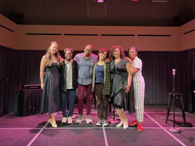 Shaw Festival theatre artists and intern on the stage.