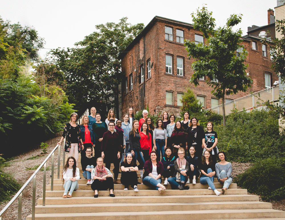 2018 Brock Chamber Choir and Women's Choir on stairs outside building