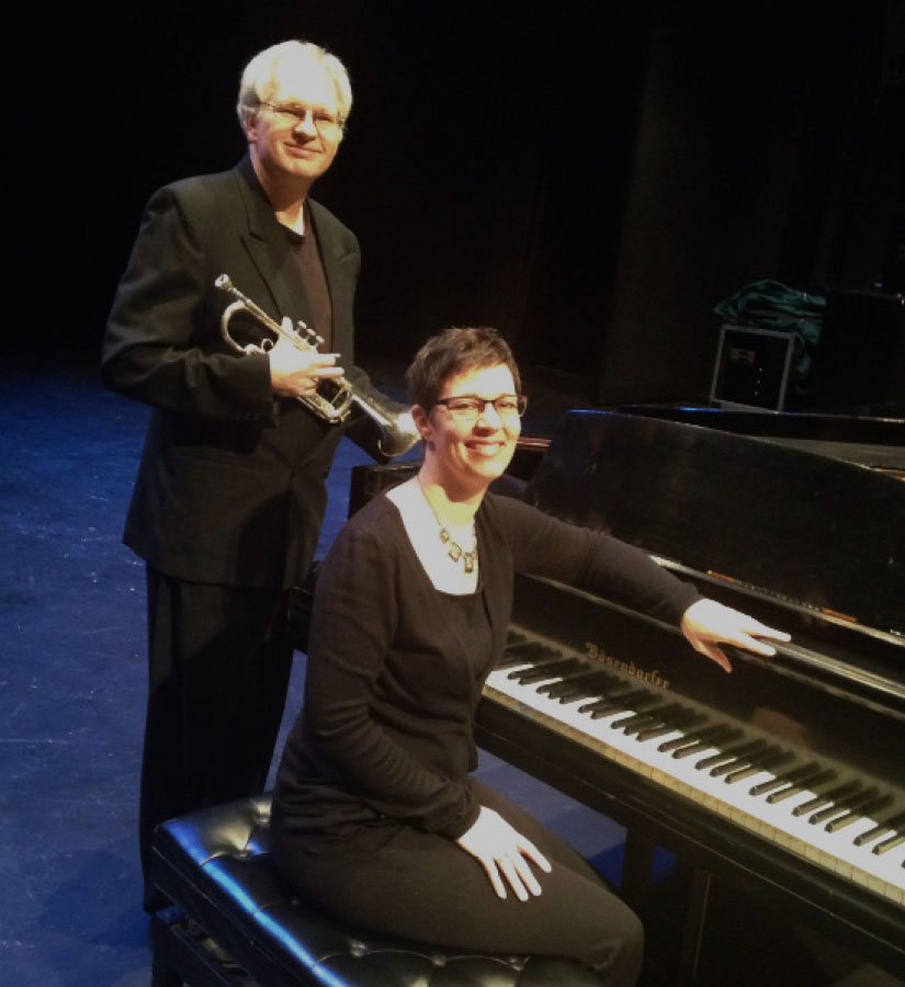 Timothy White holding trumpet and Lesley Kingham at piano