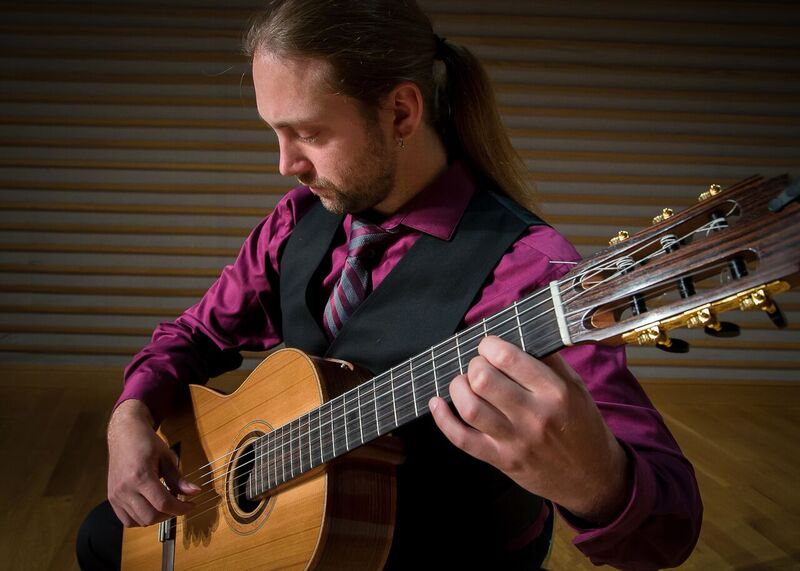 Student guitarist playing